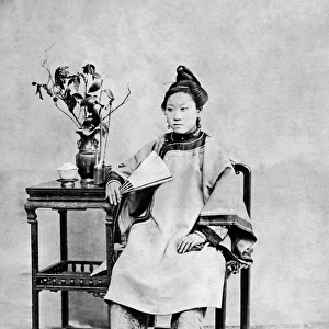 Woman with bound feet, China