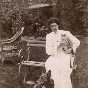 Woman with her cat and dog