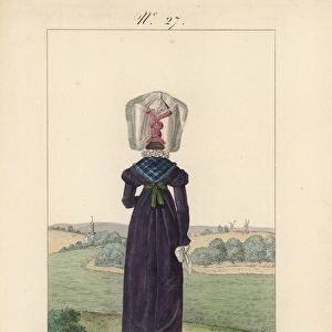 Woman in costume of Coutances: rear view of