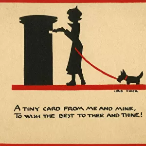 Woman with dog posting a Christmas card