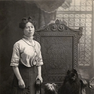 Woman with two hairy dogs