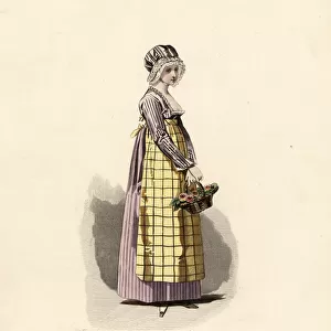 Woman in pansy dress with straw-coloured apron