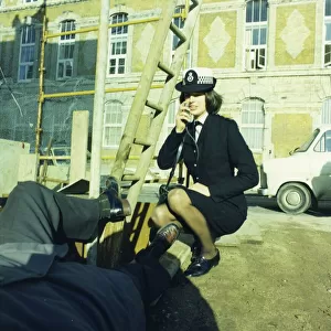 Woman police officer attending an accident