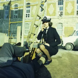 Woman police officer attending an accident