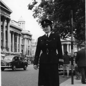 Woman police officer on duty in Central London