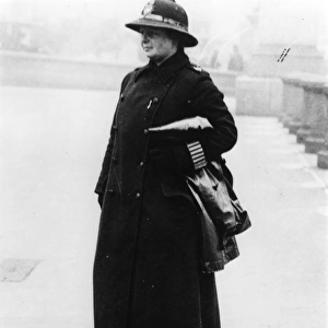 Woman police officer on duty, London