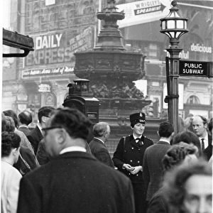 Woman police officer at Piccadilly Circus, London