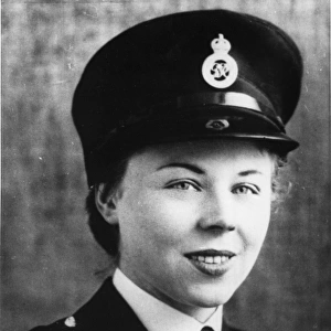 Woman police officer in studio photo