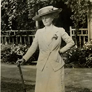 Woman resting during a game of croquet
