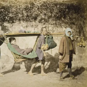 A woman riding in a palanquin