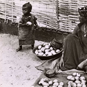Woman selling Mangoes on the street - Dakar, Senegal