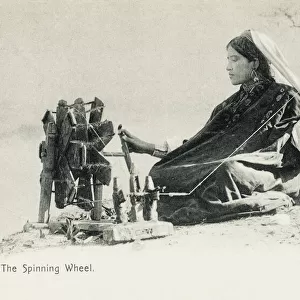 Woman spinning - India