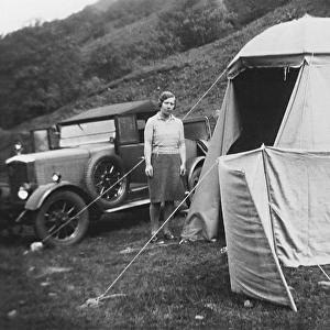 Woman with tent and car, Stratheyre, Isle of Skye, Scotland