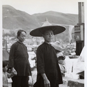 Woman in traditional hat - Hong Kong, China