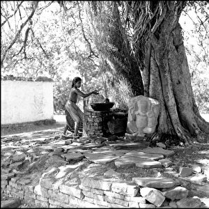 Woman at a well, India
