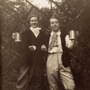 Two women in fancy dress with tankards