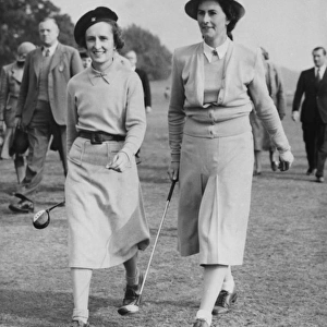 Two women golfers on a golf course
