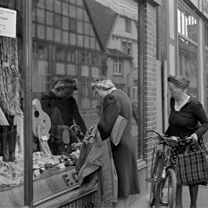 Women looking in a shop window