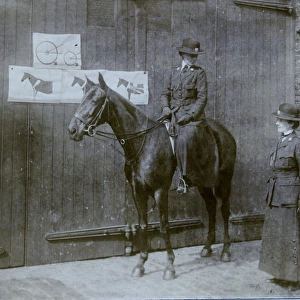 Women police officers, one on horseback