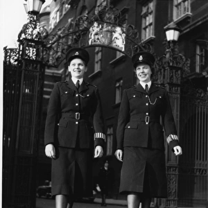 Two women police officers in a London street