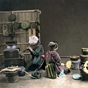 Three women preparing a meal, Japan