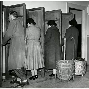Women recording votes for the General Election 1955