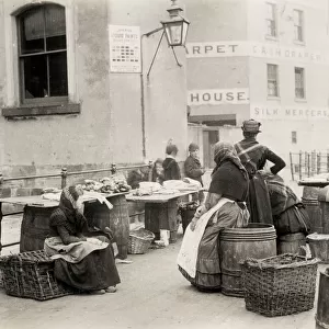 Women selling fish on the quay, Whitby Yorkshire