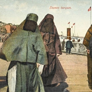 Two women with full veils on the Galata Bridge