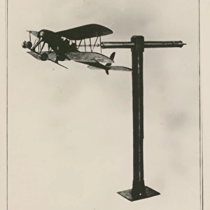 Wooden aeroplane model mounted for autorotation experiment