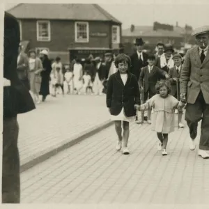 Working class gent with his two young daughters