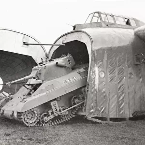 WW II - T-19 Locust tank emerging from a Hamilcar gilder