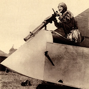WW1 - Lady aviator air-gunner demonstration in aeroplane
