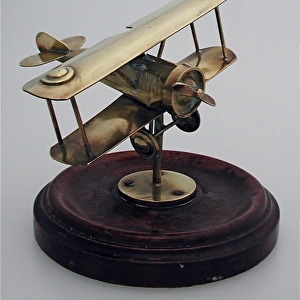 WW1 metal biplane on a wooden base