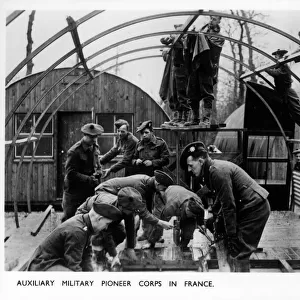 WW2 - Auxiliary Military Pioneer Corps erect Nissen Huts