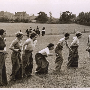 WW2 - Land Army Girls having a sack race