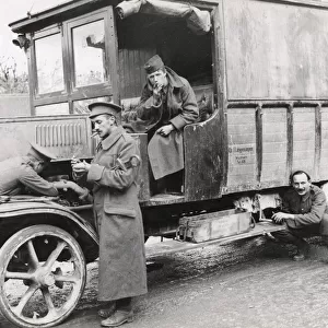 WWI: British soldiers with captured German vehicle