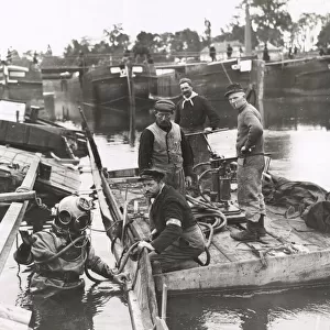 WWI: divers clearing sunken pontoon bridge, River Oise