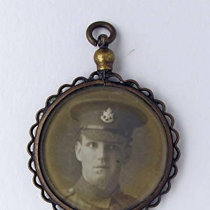 WWI mourning fob with two photographs