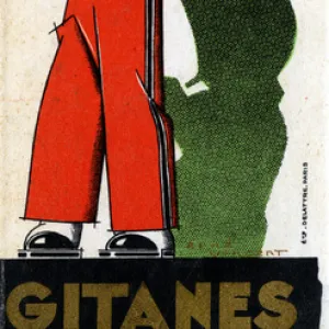 A young bellboy lights up his Gitanes Cigarette