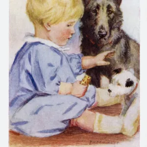 Young boy with pet dogs