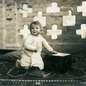 Young child on an exotic rug, Middle East