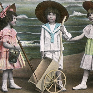 Three young children at the seaside - kitsch postcard