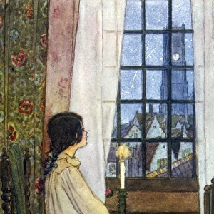 Young girl watches a falling star