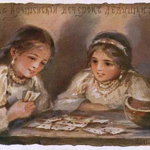 Two Young Jewish girls play cards - Christmas Eve - Russia