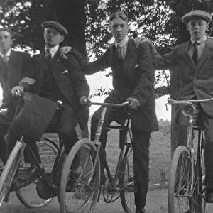 Five young men on their bicycles