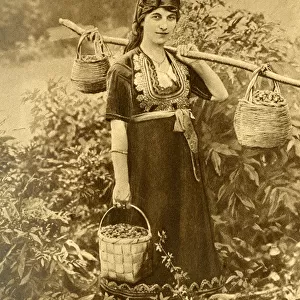 Young peasant woman in traditional dress, Bulgaria