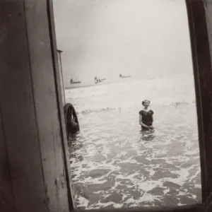 Young woman bathing at Scarborough, North Yorkshire