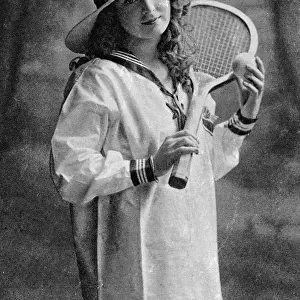 Young woman holding a tennis racket