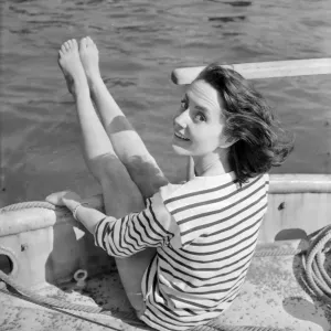Young woman modelling on a boat Young woman modelling on a boat