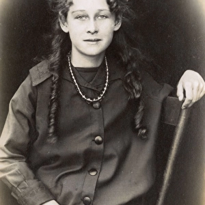 Young woman with ringlets and bow, USA